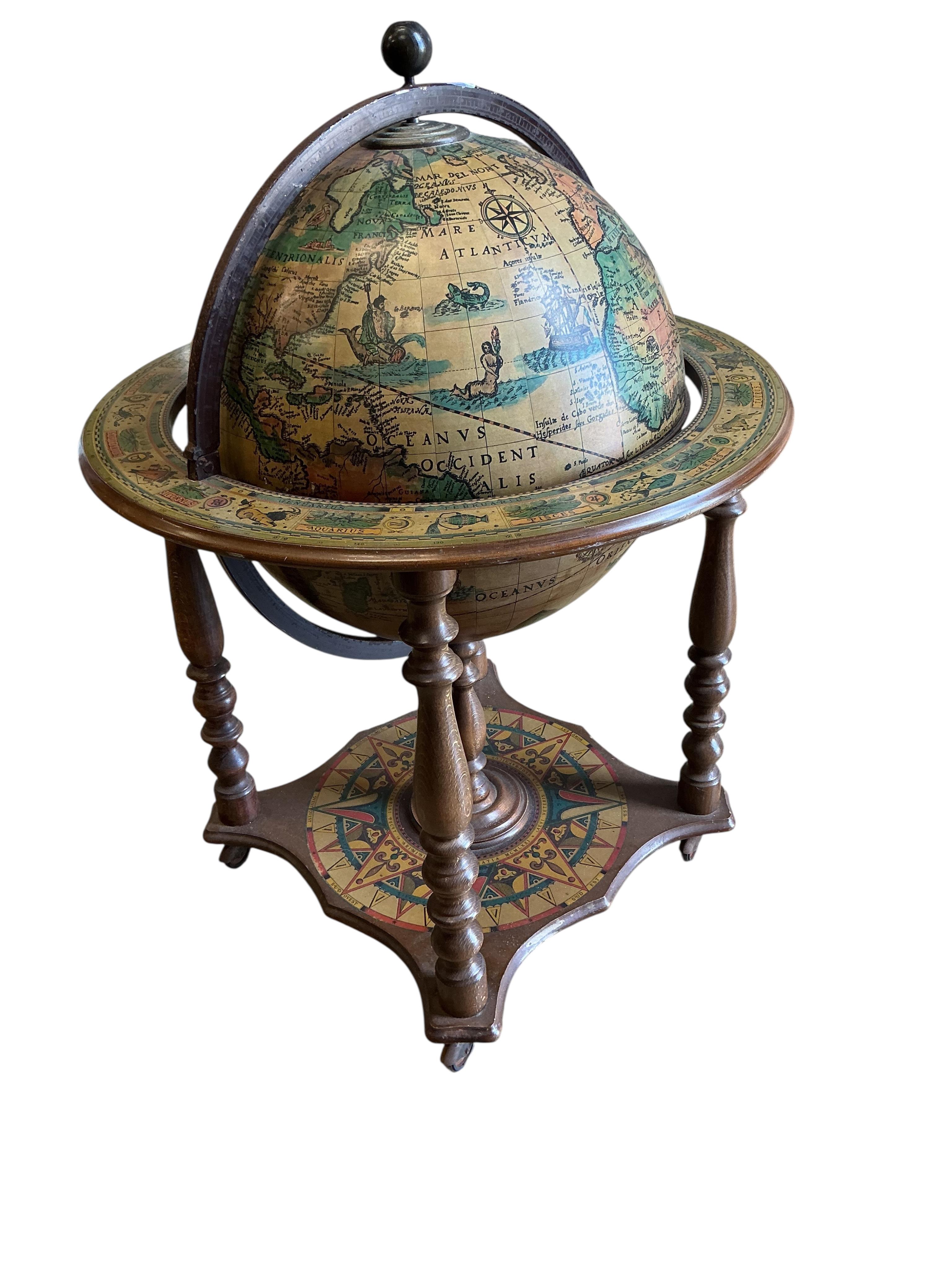 A globe; interior as a drinks cabinet, height 94cm